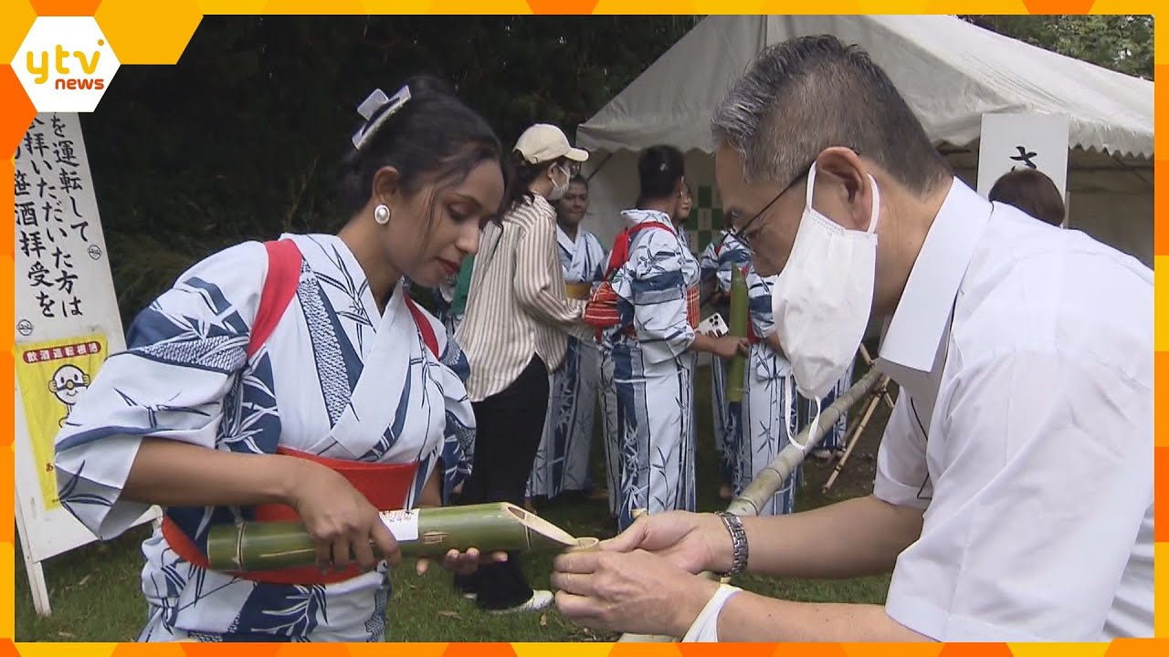 がん封じの寺で無病息災願う竹筒から注がれた酒飲む笹酒夏祭り奈良大安寺