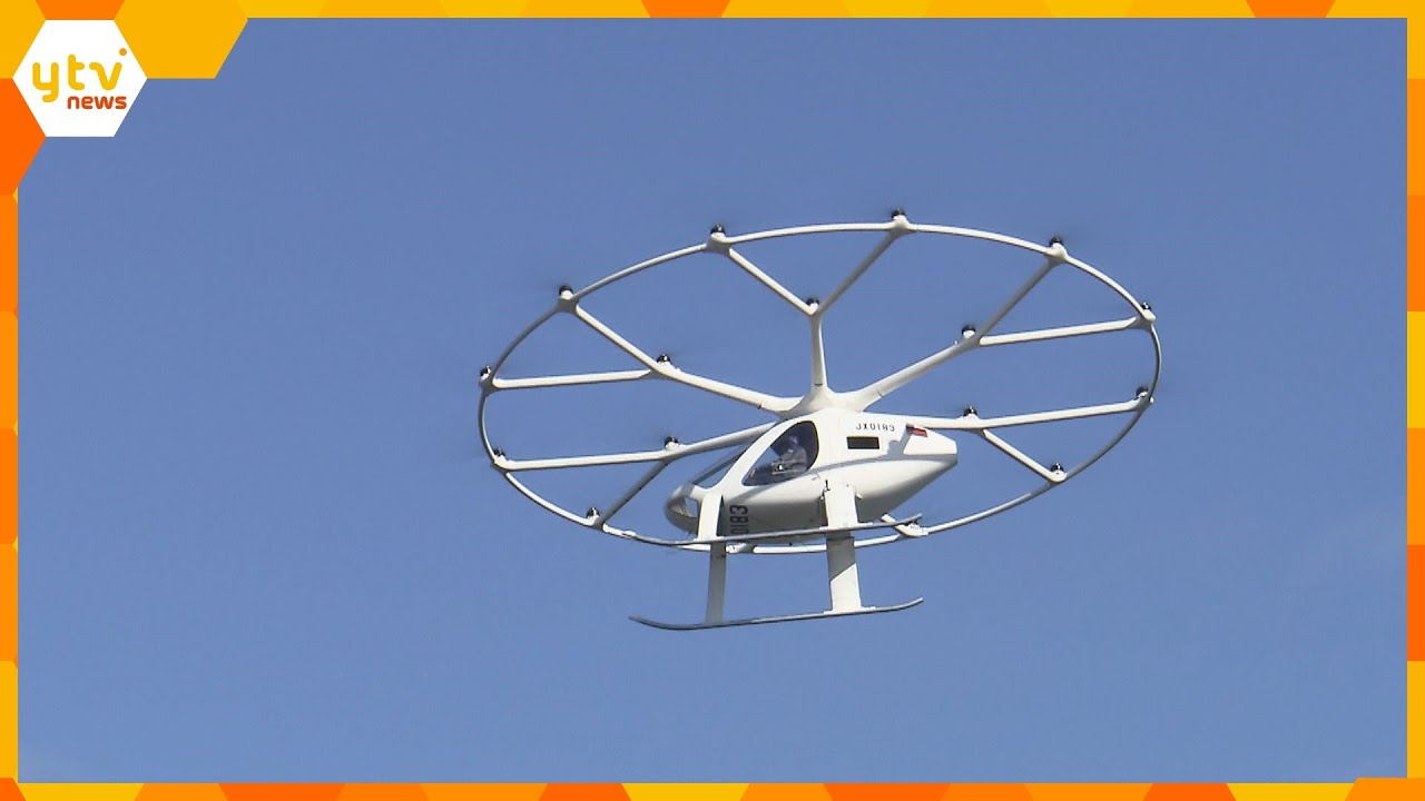 全長10メートル、2人乗り「空飛ぶクルマ」試験飛行　50メートルの高さで5分間　万博で運航目指す