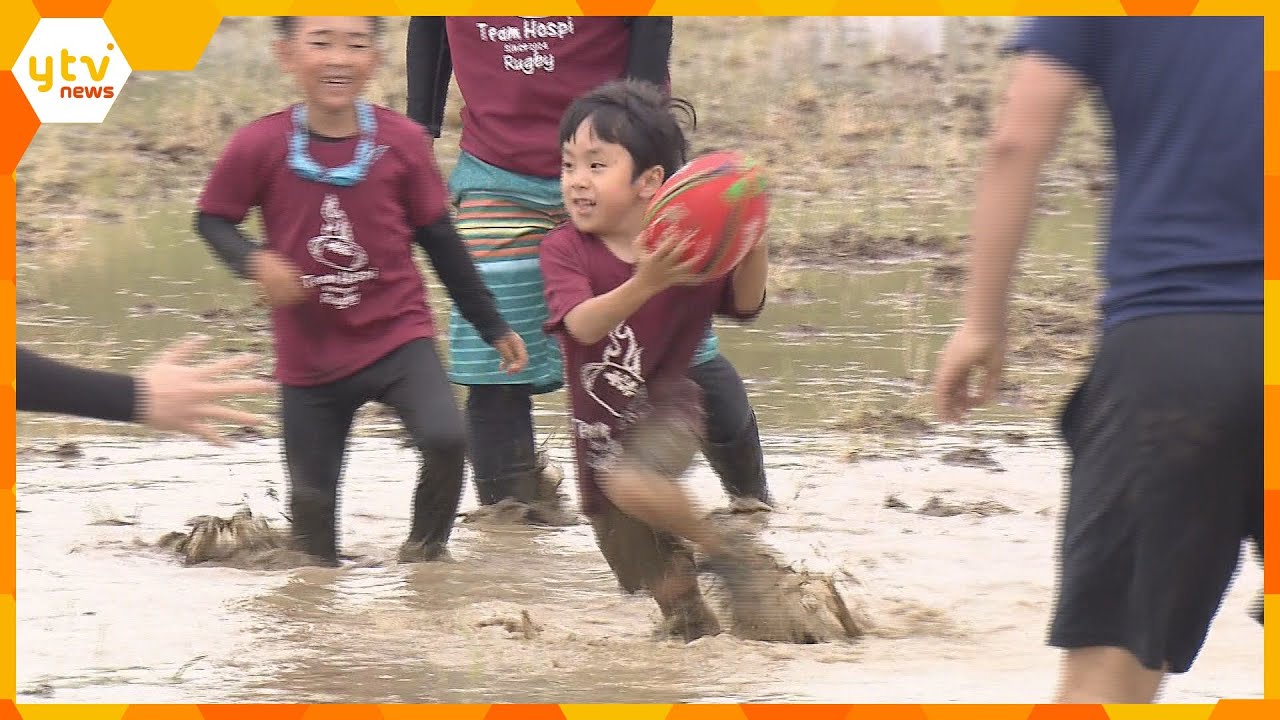 豪快トライ！『田んぼラグビー』田植え前の水田で熱戦繰り広げられる　全国から約230人参加　福知山